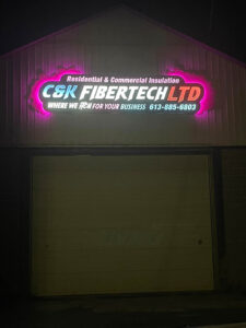 C&K Fibertech's new building sign lit up in the dark