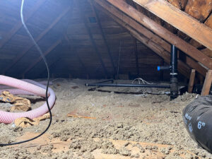 attic prior to having new blown in insulation added