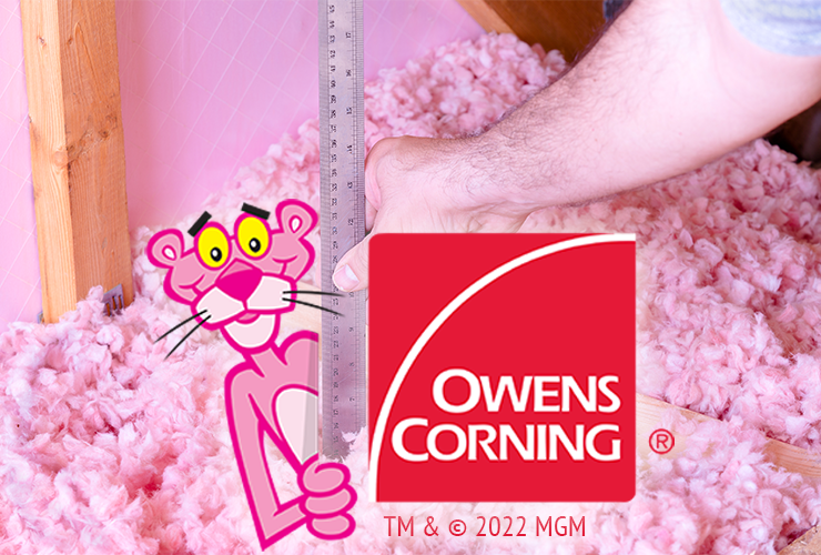 blown in insulation being measured with Pink Panther mascot & Owens Corning logo